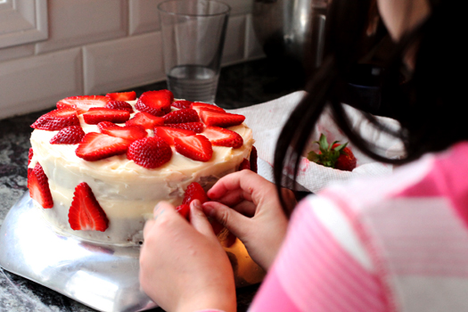 STRAWBERRY SHORTCAKE CAKE – This strawberry shortcake cake recipe by The Pioneer Woman, Ree Drummond, is made of layers of dense vanilla butter cake and filled homemade cream cheese frosting and fresh sweetened strawberries. Add candles to it for the perfect Strawberry Shortcake Birthday Cake or just enjoy as is!